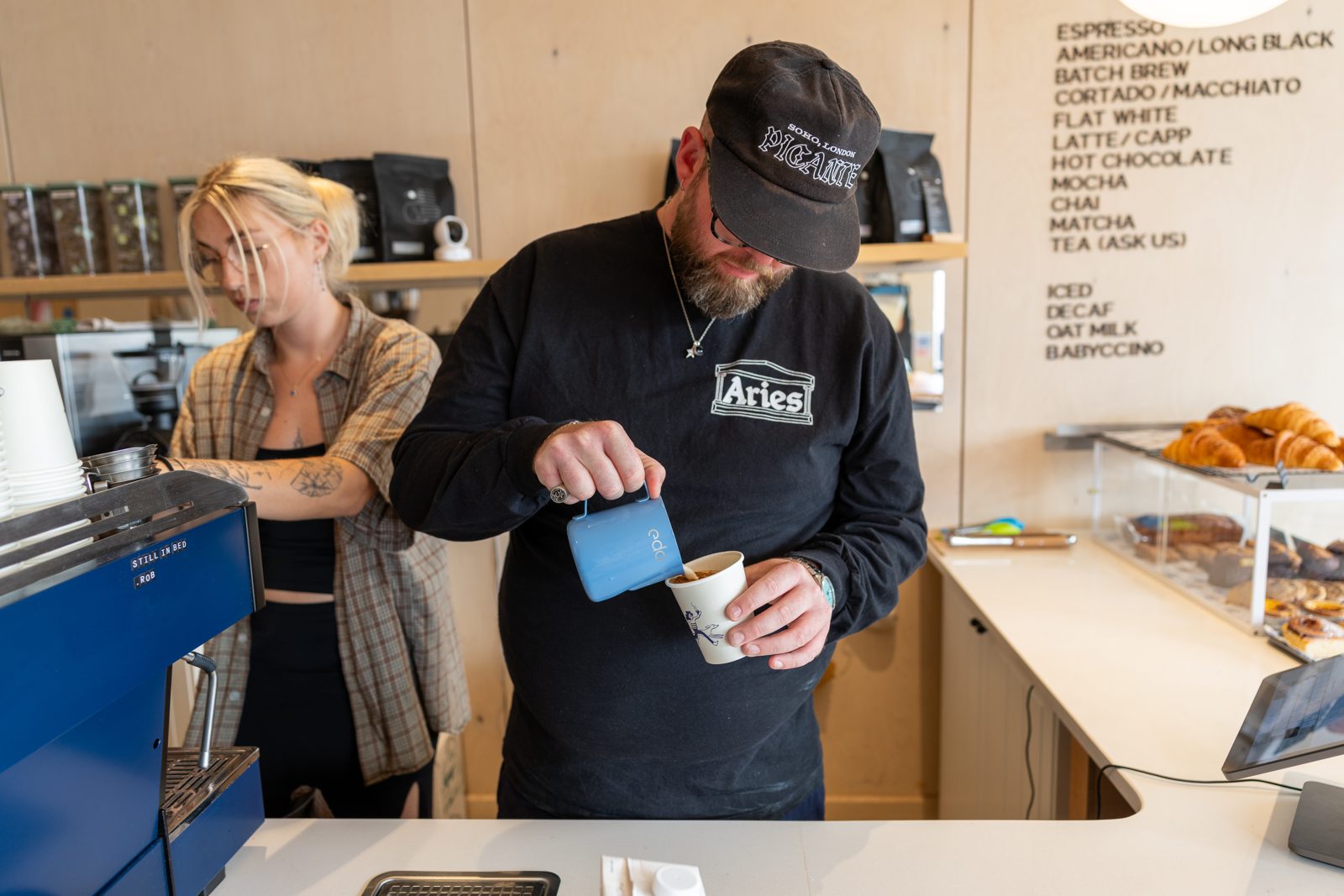 Barista pouring at the Leo's flagship in Camber Sands